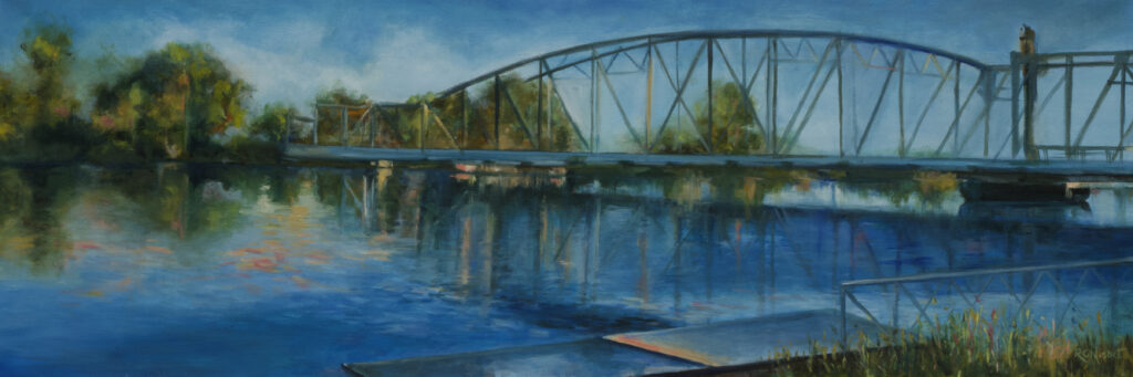 Metal bridge over canal.